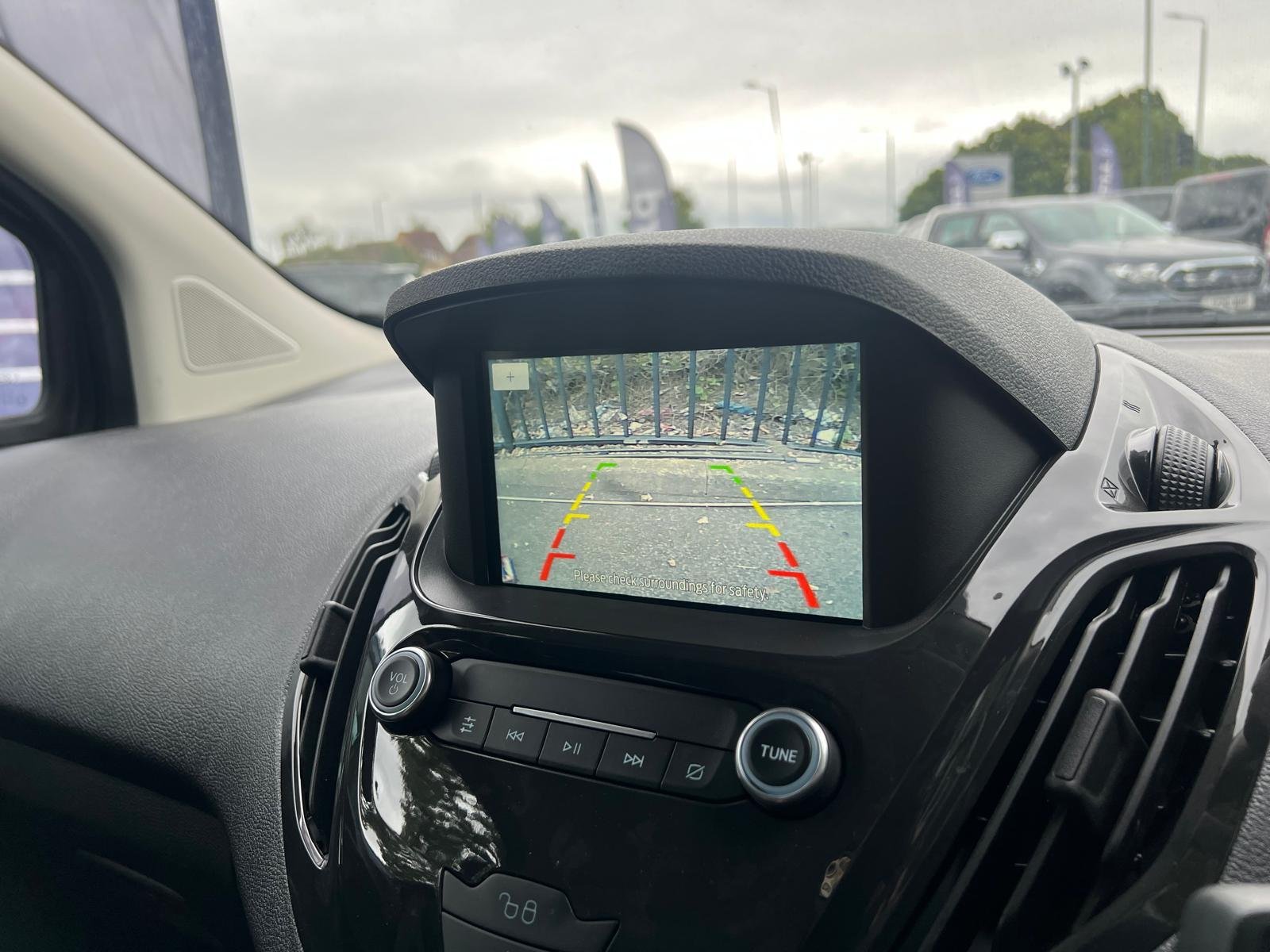 Reverse camera view shown on a van's dashboard screen